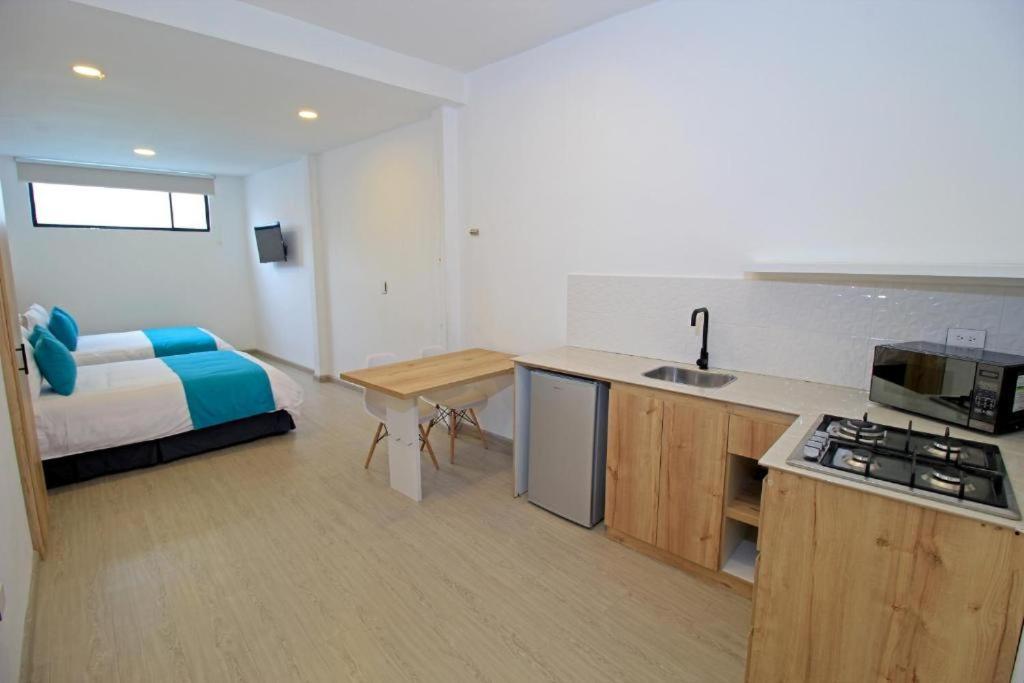 Apart Hotel Casa Blanca 昆卡 外观 照片